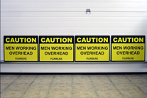 Caution men working overhead